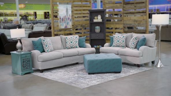 a gray and blue couch within the weekends only store